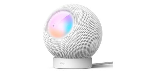 A white round device with a colorful circle on it