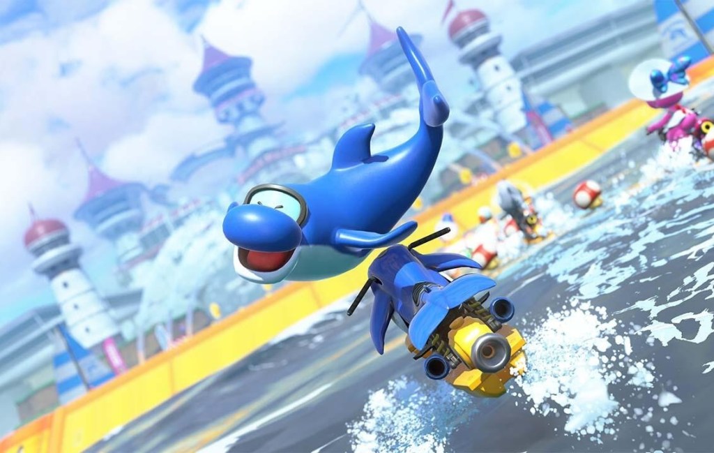 A blue dolphin riding a toy motorcycle