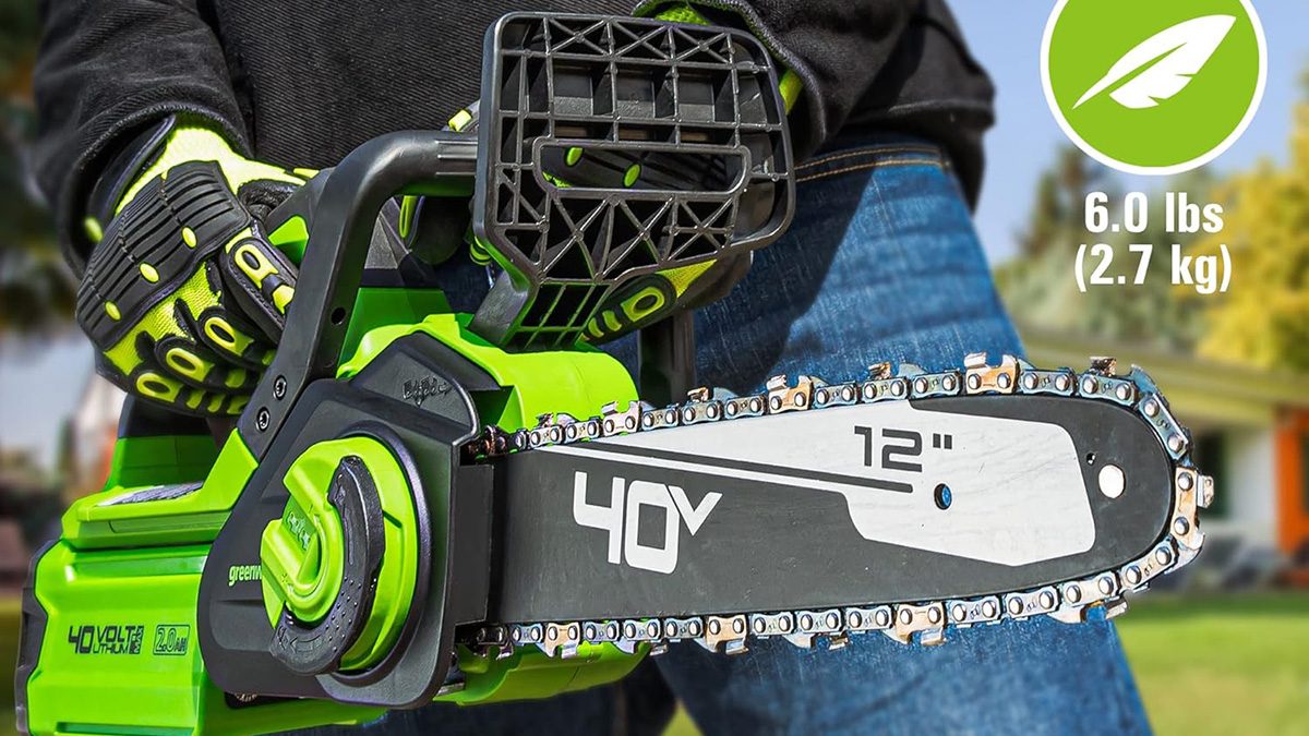 A person holding a chainsaw