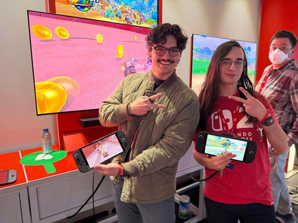 A group of people holding phones