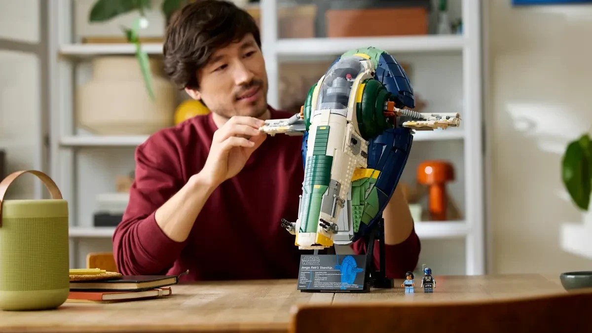 A man playing with a toy