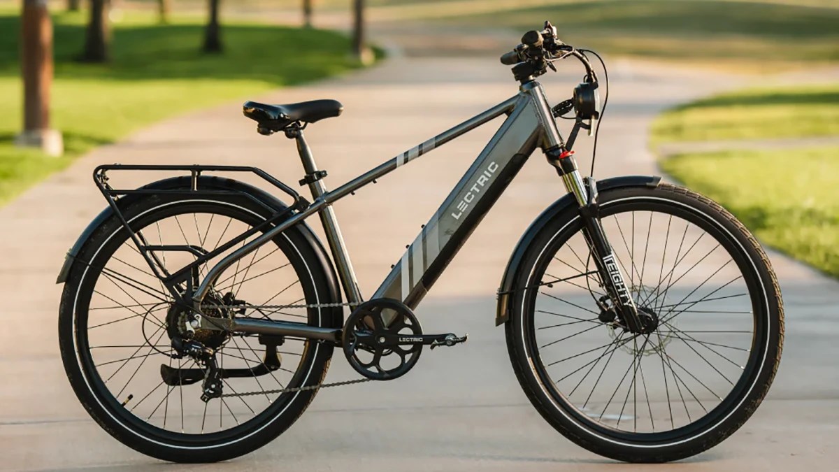 A bicycle parked on a sidewalk