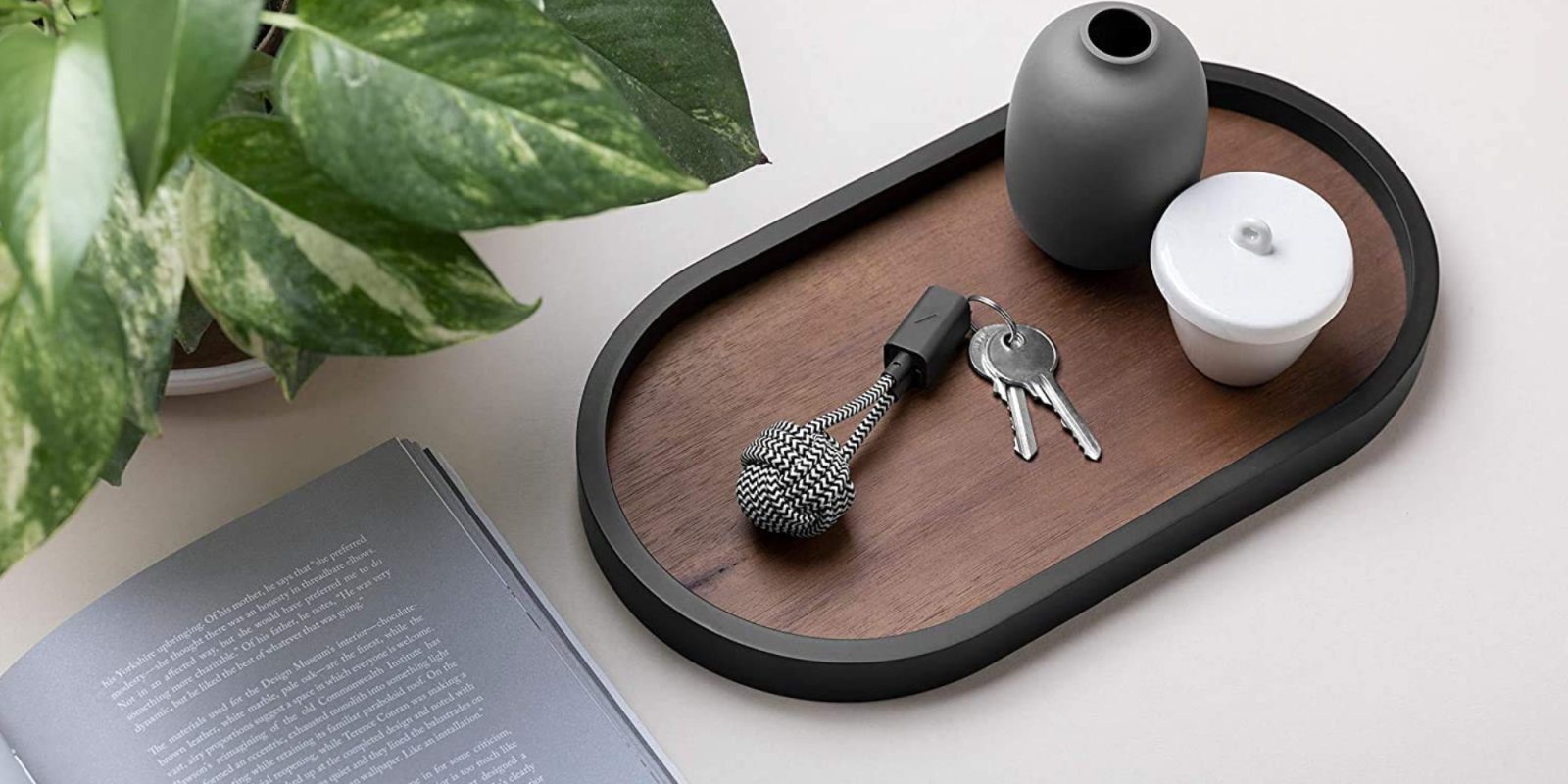 A tray with keys and a bowl on it