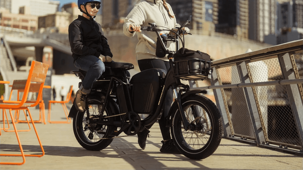 A woman and boy on a motorcycle