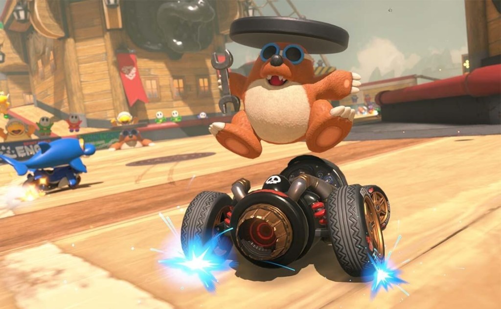 A cartoon animal in a hat on a vehicle