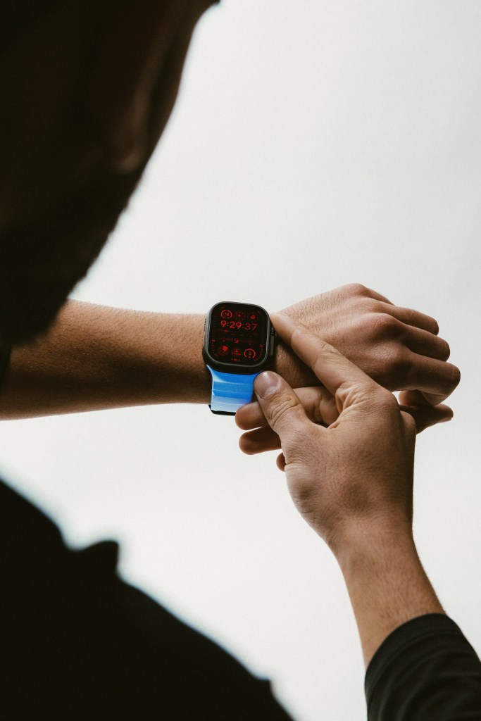 A person checking the time on their wrist