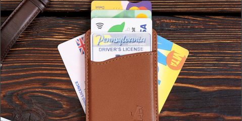 A wallet with credit cards and a few other cards
