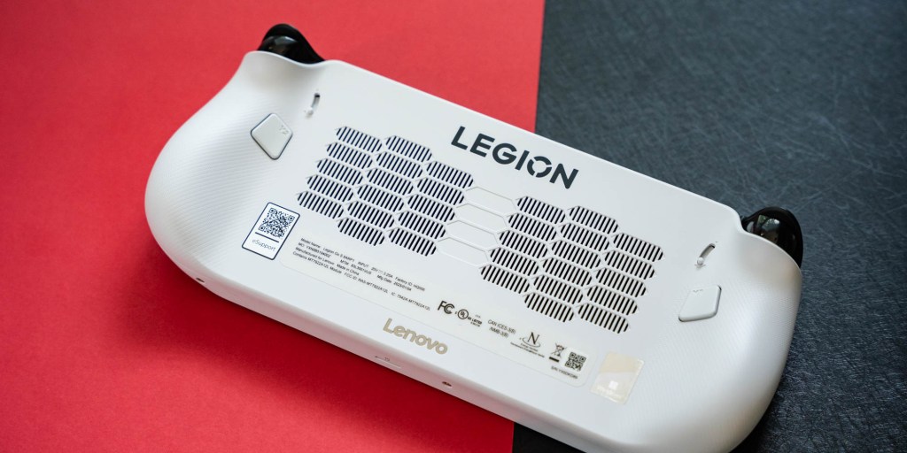 A white rectangular device with a black and red background