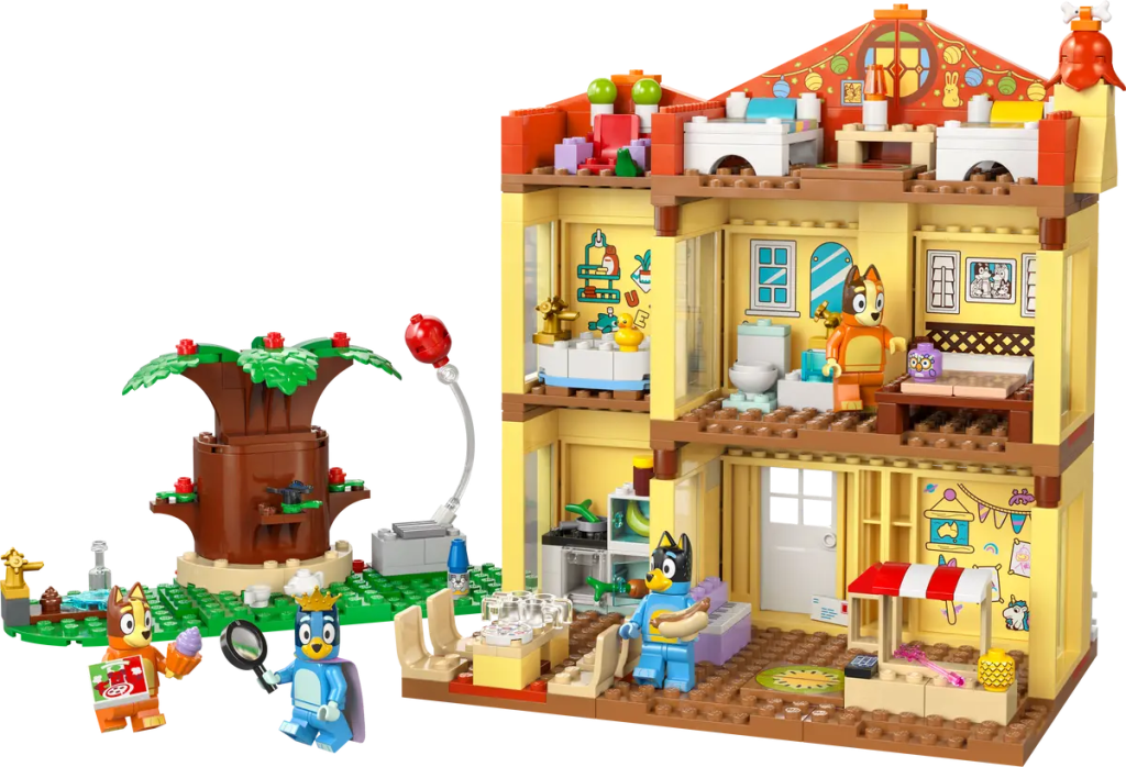 A toy building set with a house and a tree