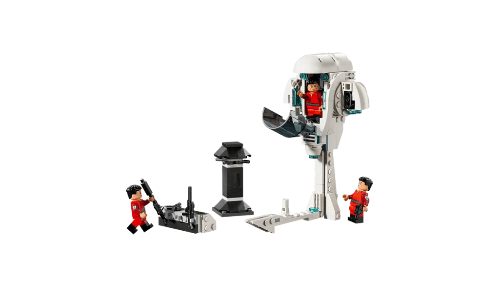 A toy building blocks with people in the back