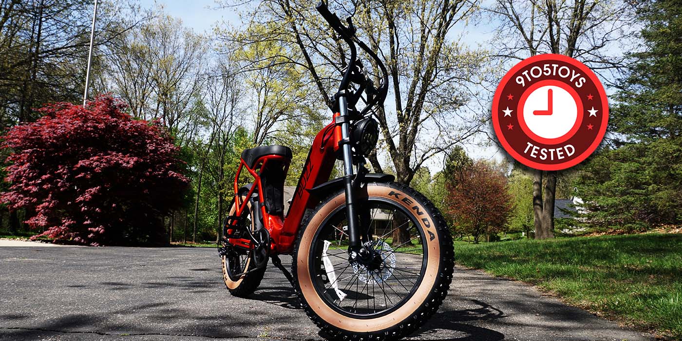 A red bike on a road
