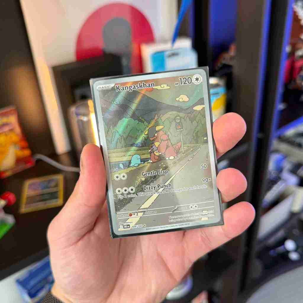 A hand holding a card