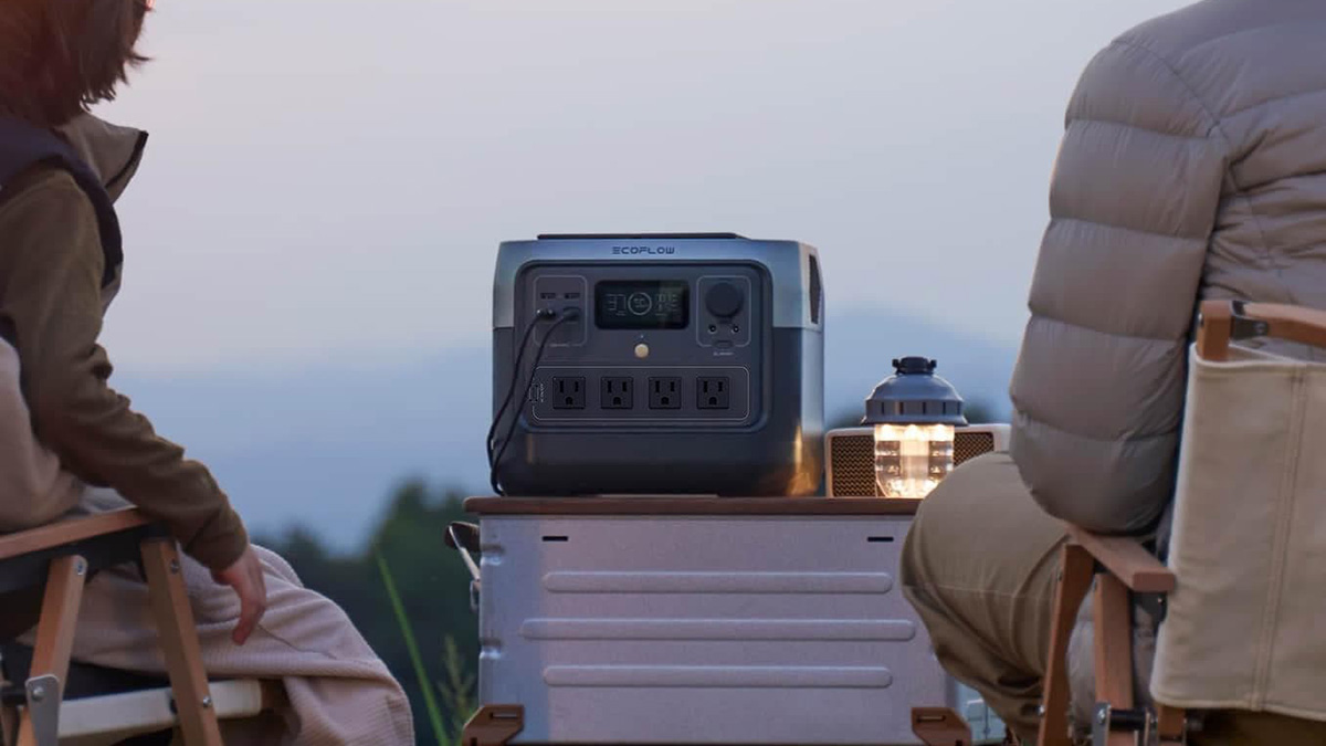 A group of people sitting outside