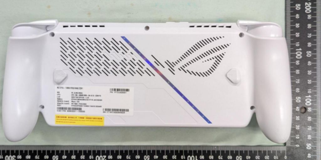 A white rectangular device with a ruler