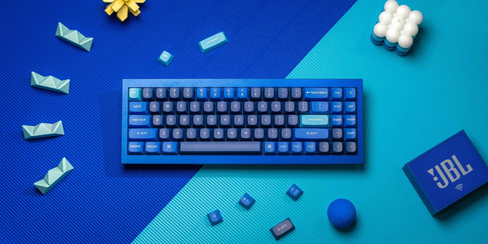A keyboard on a blue surface