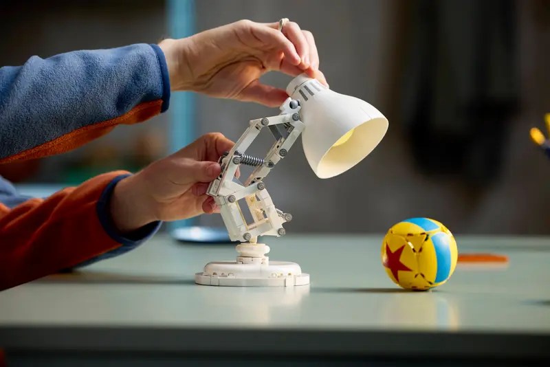 A person fixing a lamp