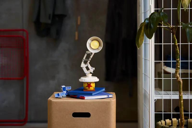 A box with a lamp on top of it