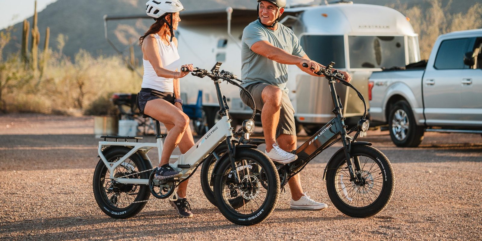 A man and woman on bicycles