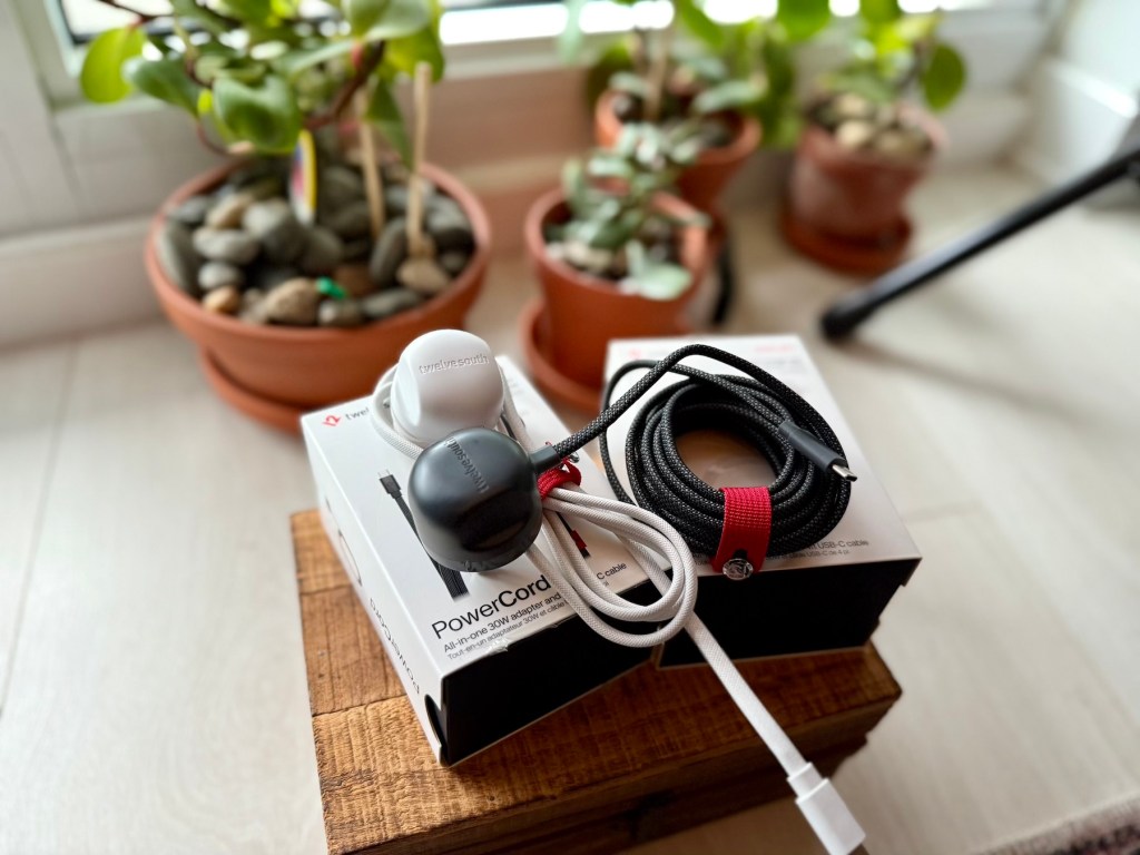 A box with a cord and a headphone on it