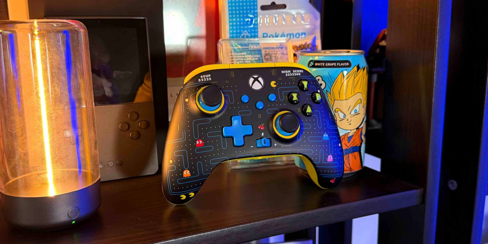 A video game controller and a mug