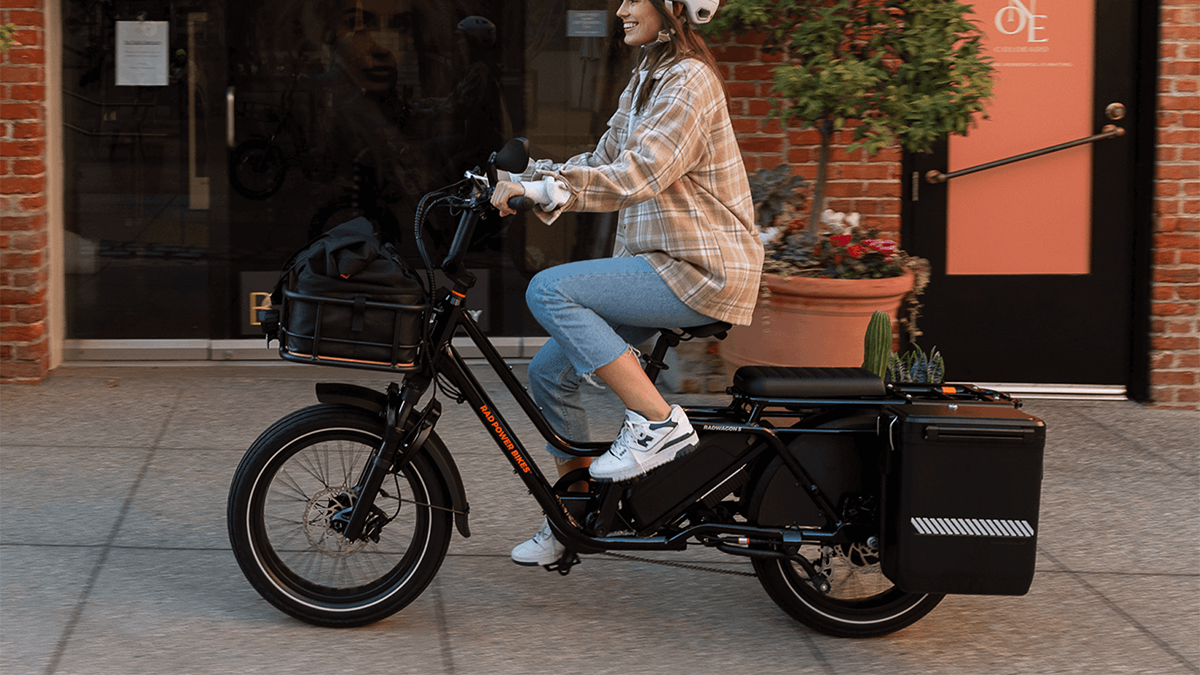 A woman riding a bike