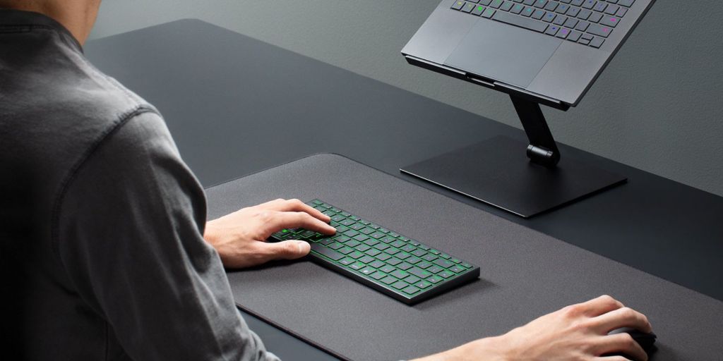 A person using a keyboard.