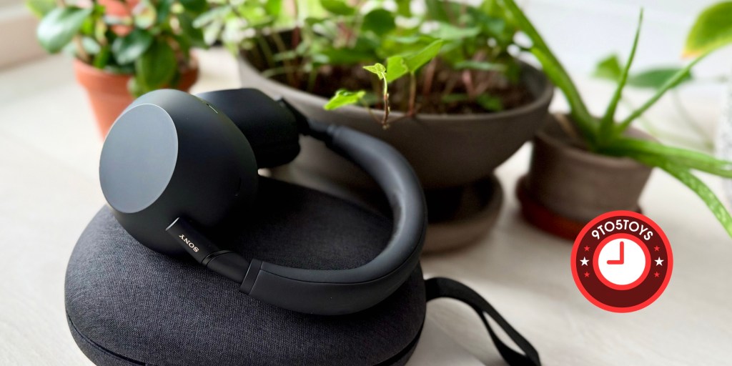 A black headphones on a black speaker