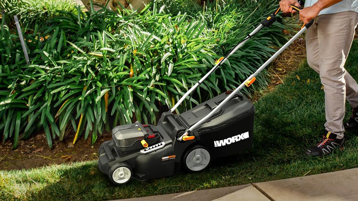 A lawn mower in the grass