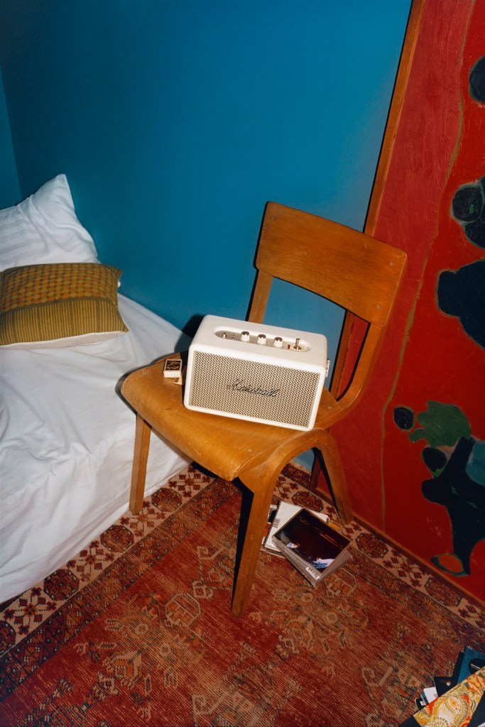 A white speaker on a chair