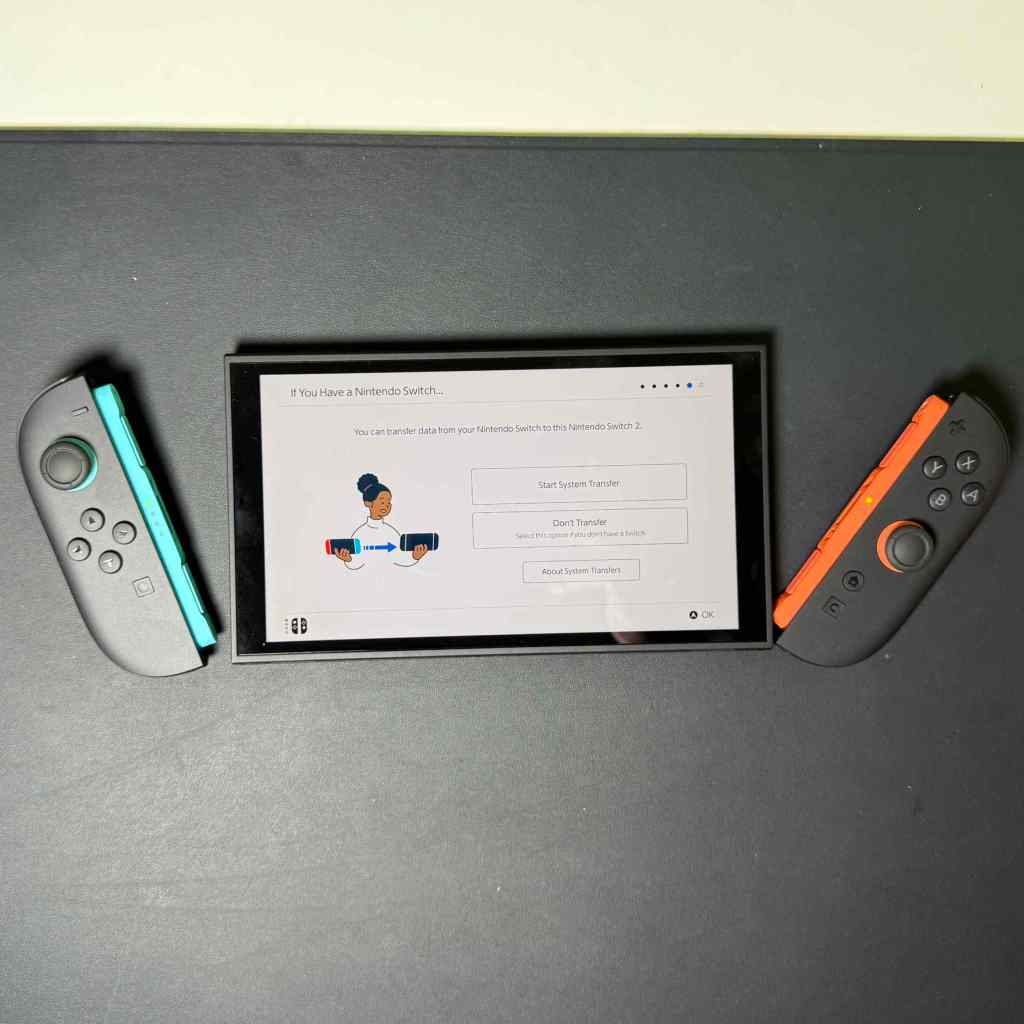 A rectangular device with a rectangular screen next to a rectangular controller