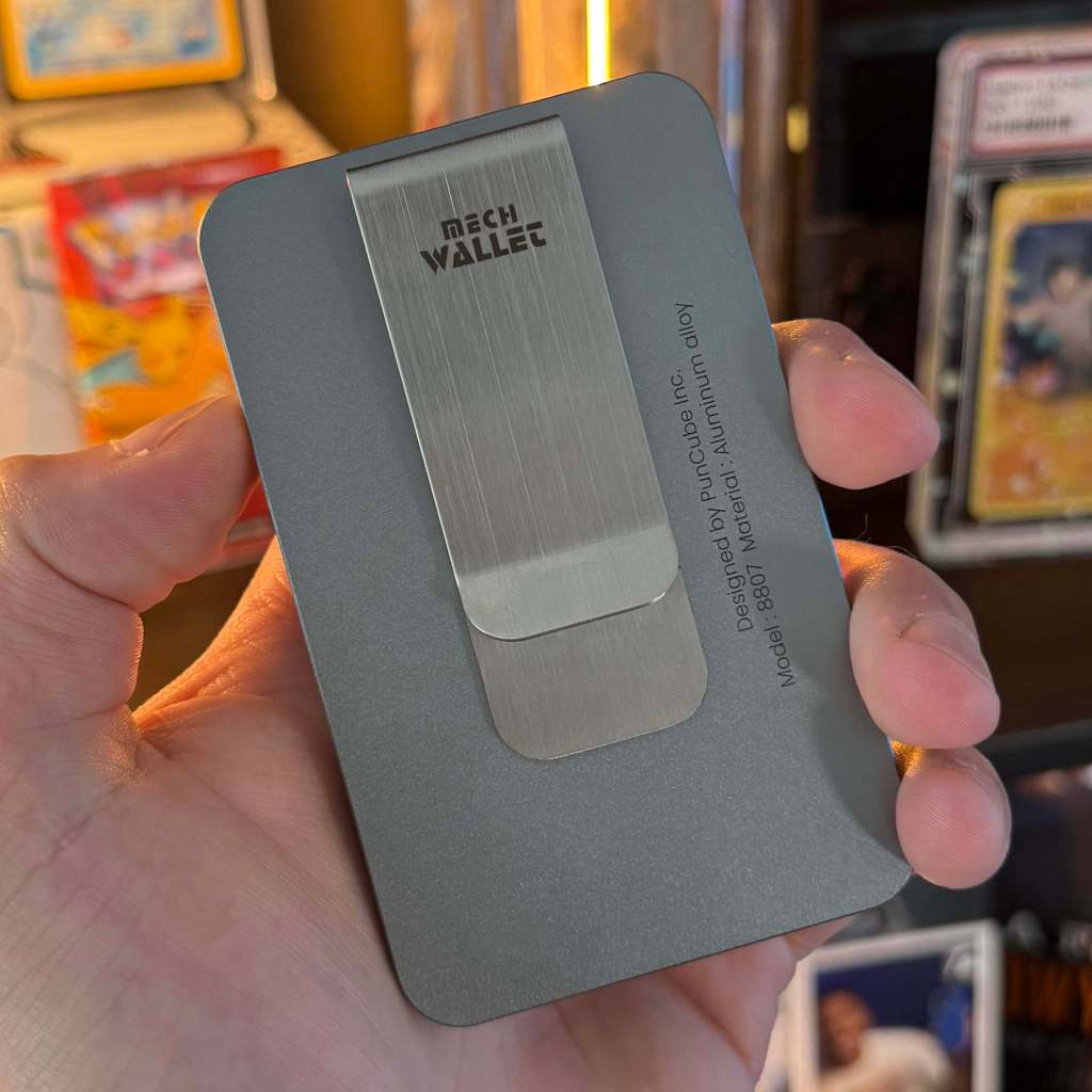 A hand holding a rectangular object