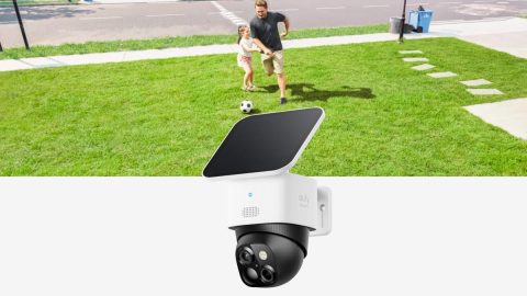 A man and child playing football