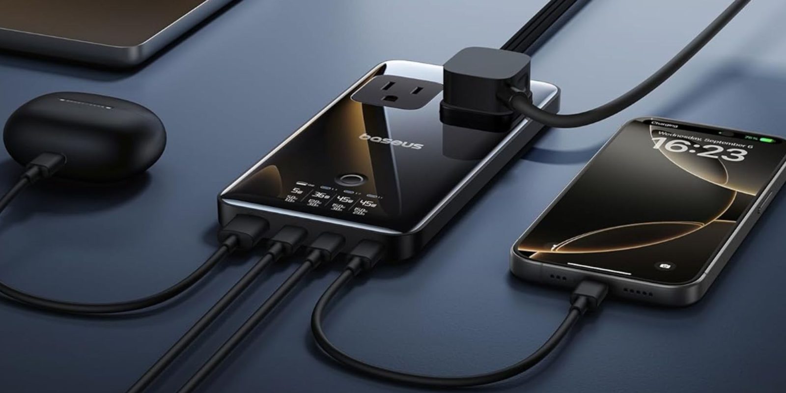 A cell phone charging with a power cord