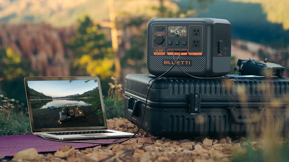 A laptop and a box with power plugs