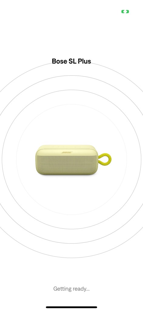 A yellow speaker with a yellow cord