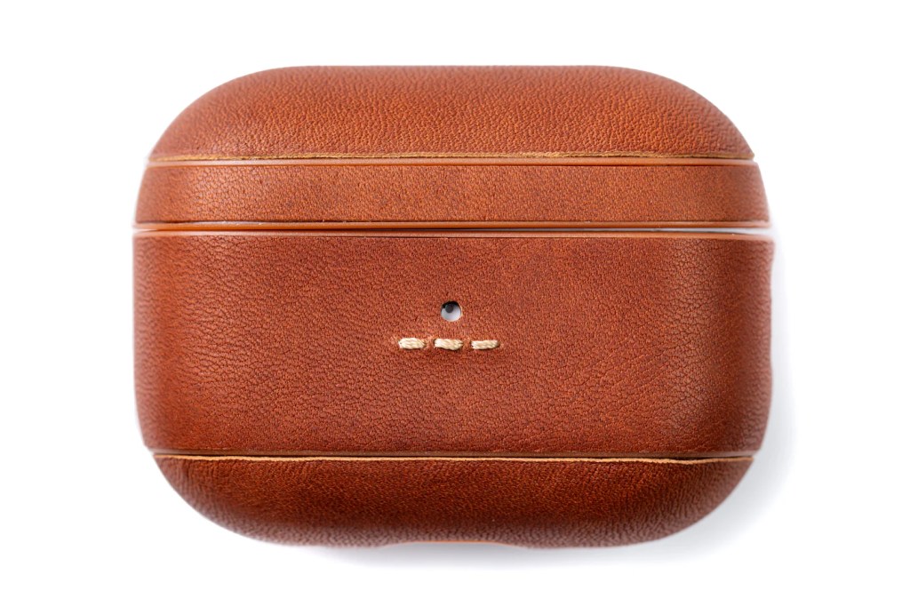 A brown leather case with stitching