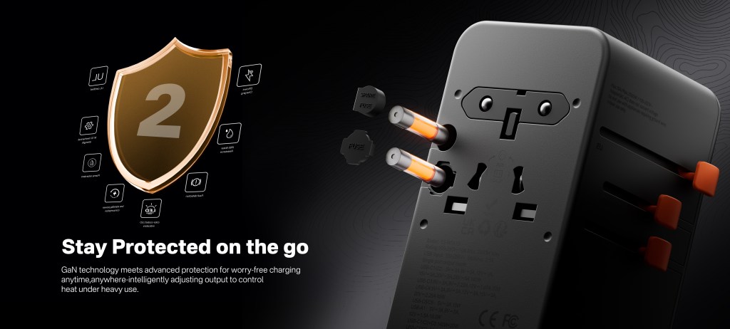 A black power outlet with orange plugs