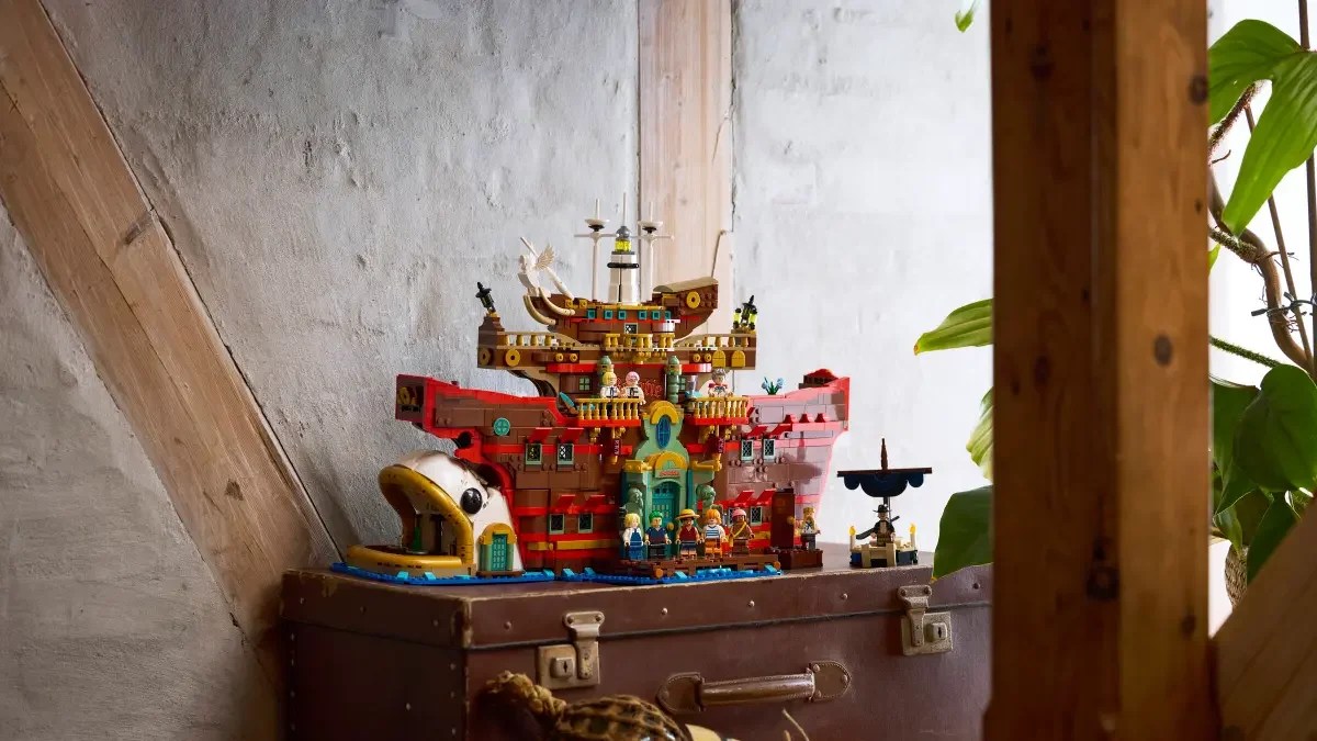 A toy building on top of a suitcase