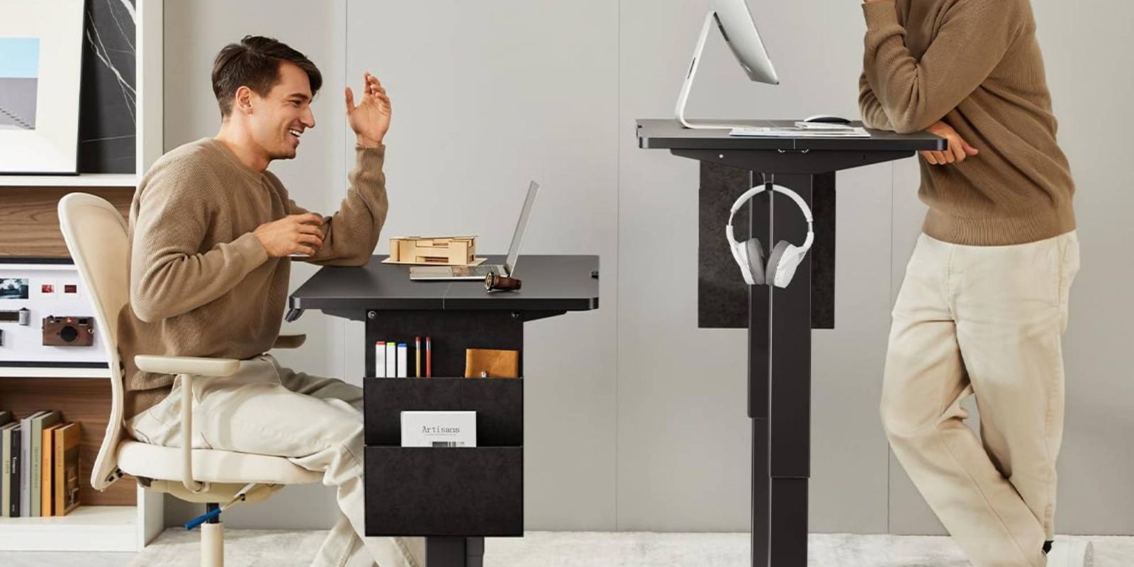 A man sitting at a desk with a computer