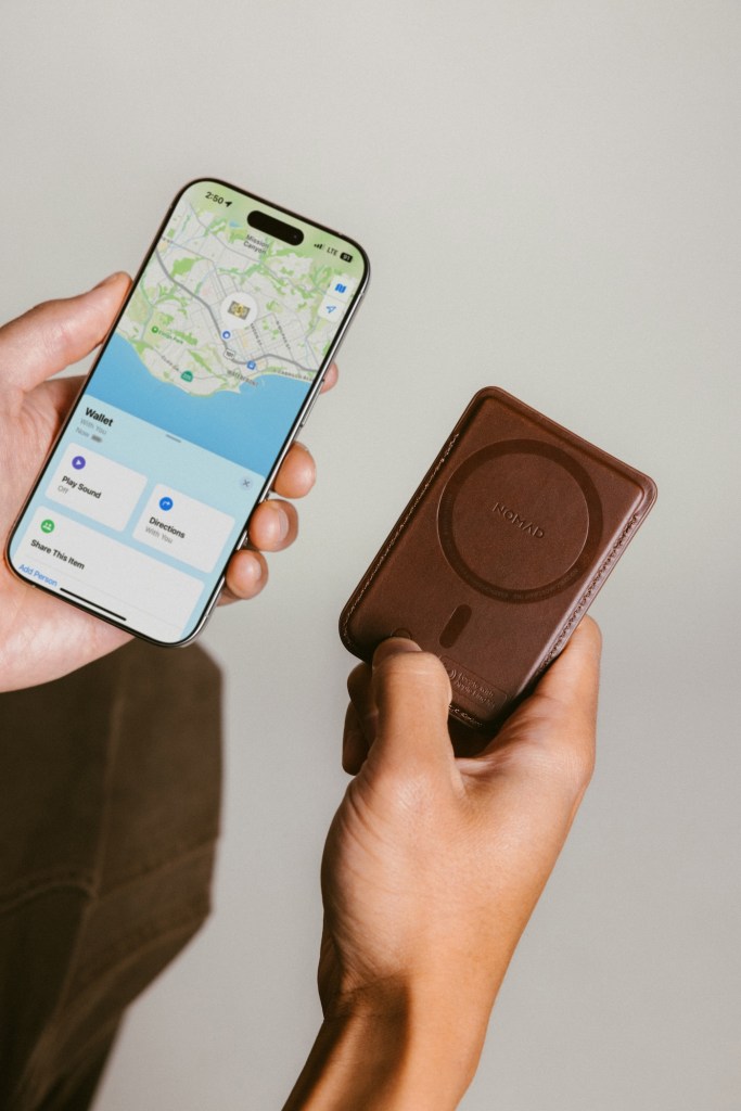 A person holding a phone and a case