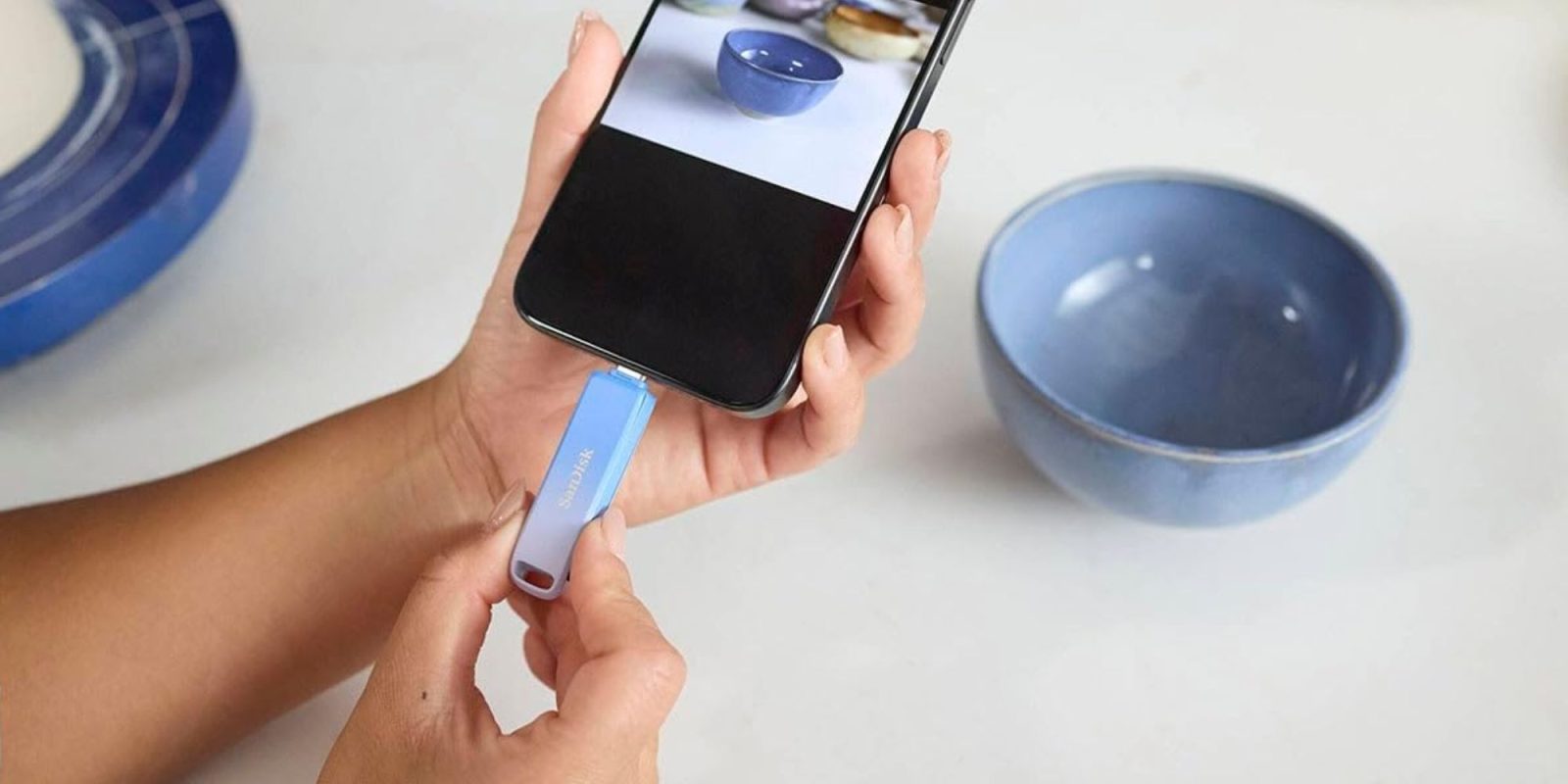 Image showing a person using SanDisk's Creator Phone drive.