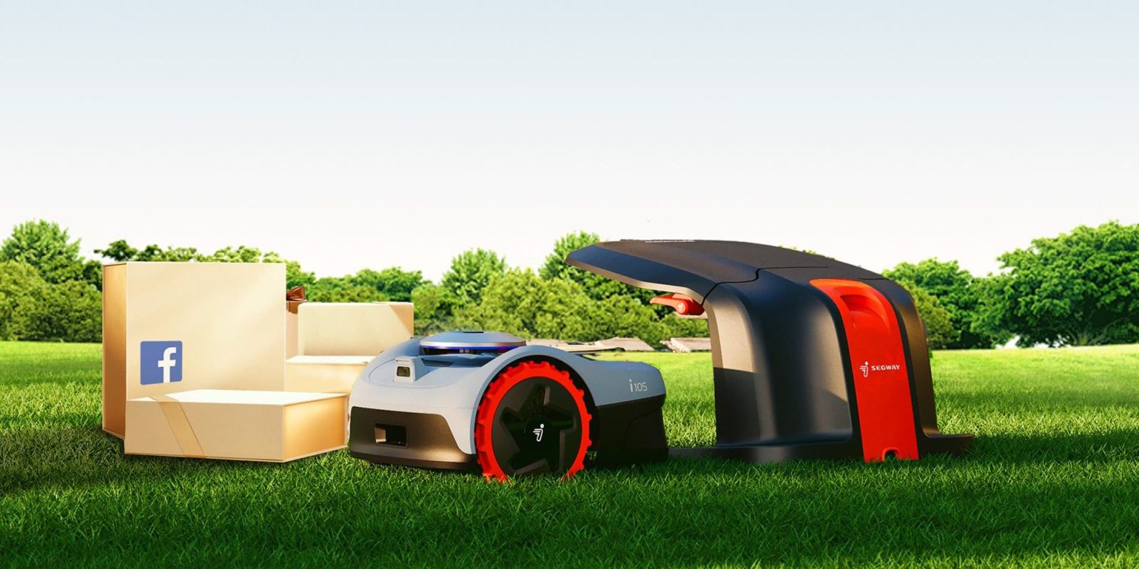 A robot on grass with boxes and trees in the background