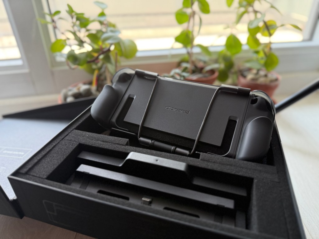 A black device in a box