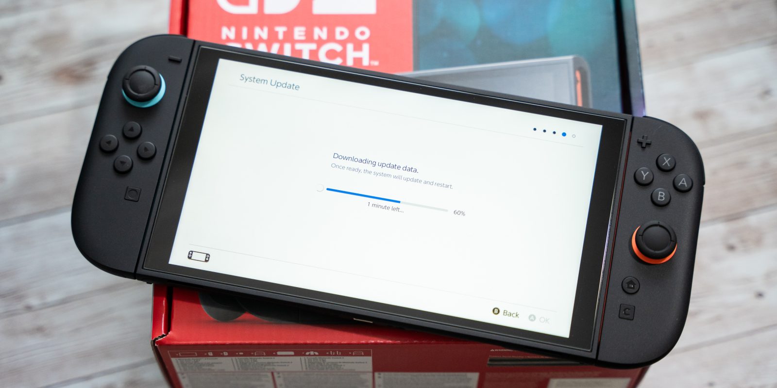 A black rectangular device with a white screen