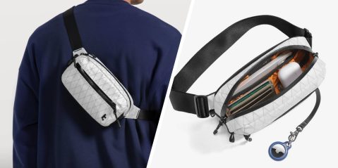 A man wearing a white waist bag