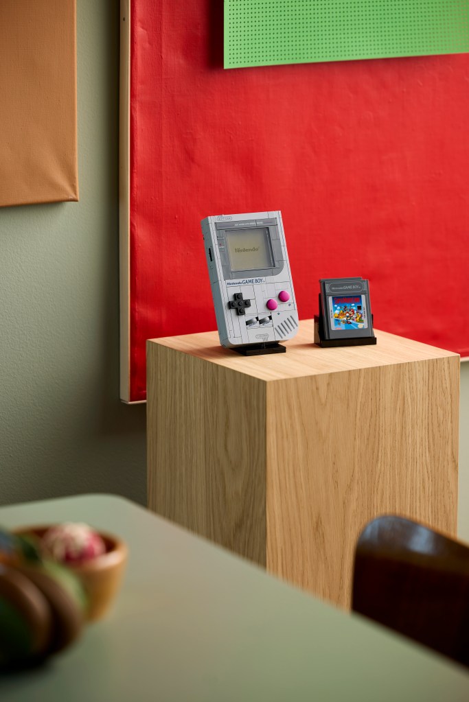 A video game console on a wooden box