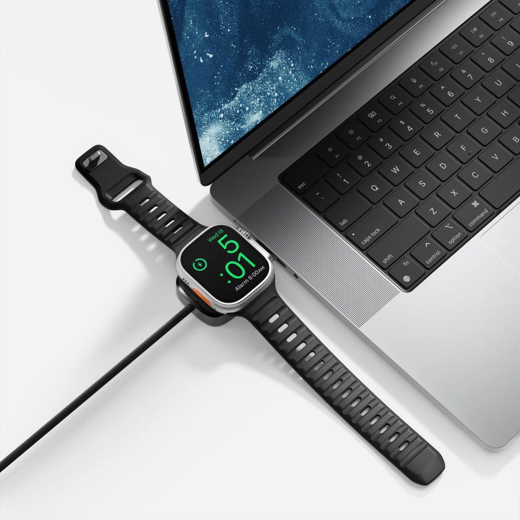 A smart watch connected to a laptop