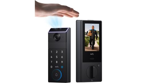 A hand reaching out to a device