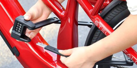 A person holding a tool