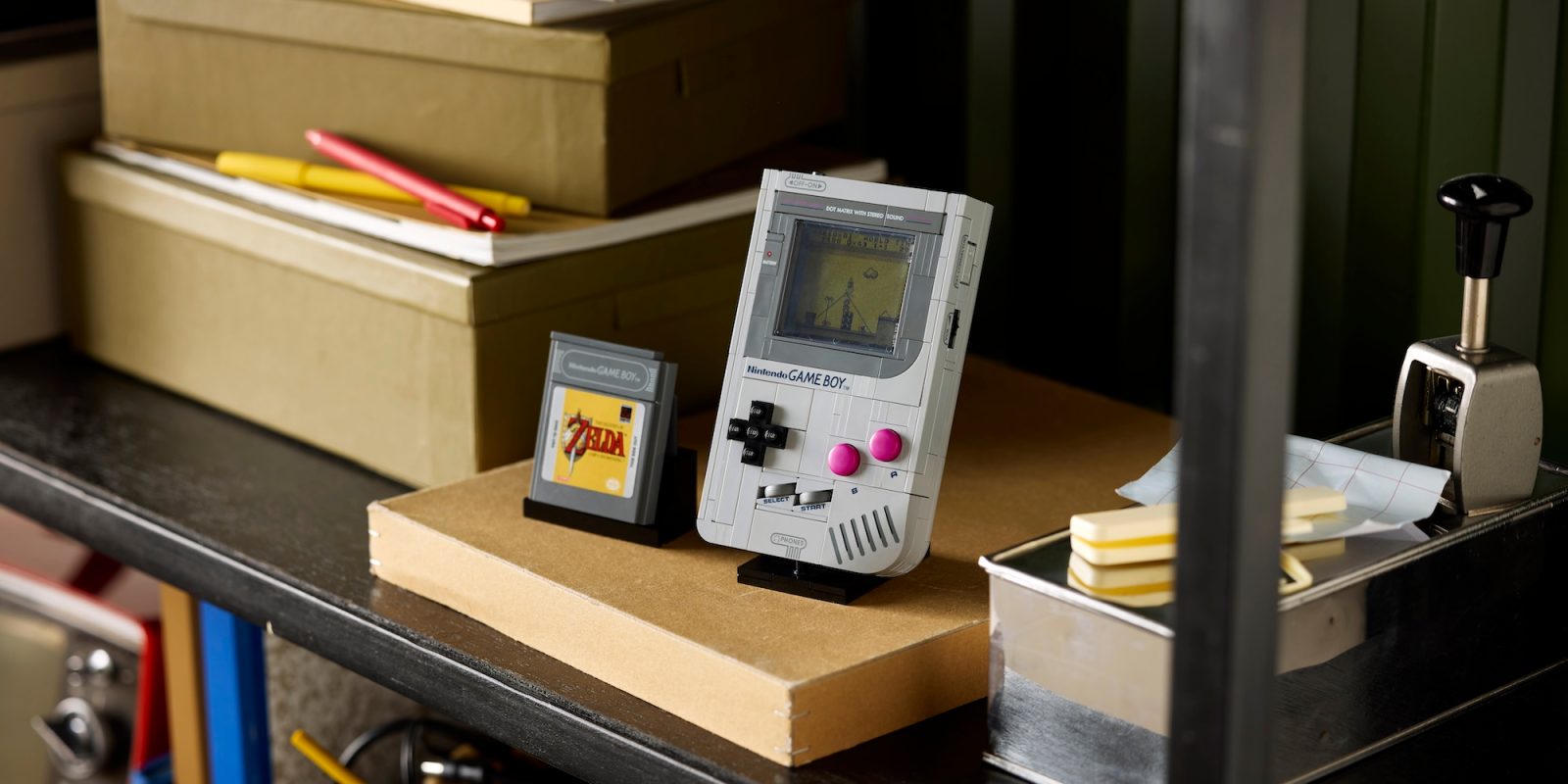 A grey handheld gaming device on a table